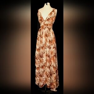 Earth-toned, floor length, women's dress. Size medium. Brand new with tags